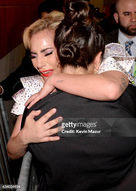 Musician Lady Gaga hugs her sister Natali Germanotta backstage after the Pepsi Zero Sugar Super Bowl LI Halftime Show at NRG Stadium on February 5,...