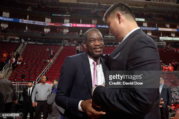 Legends, Yao Ming and Dikembe Mutumbo speak during his jersey retirement ceremony during the Chicago Bulls game against the Houston Rockets on...
