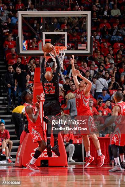 Taj Gibson of the Chicago Bulls dunks the ball against the Houston Rockets on February 3, 2017 at the Toyota Center in Houston, Texas. NOTE TO USER:...
