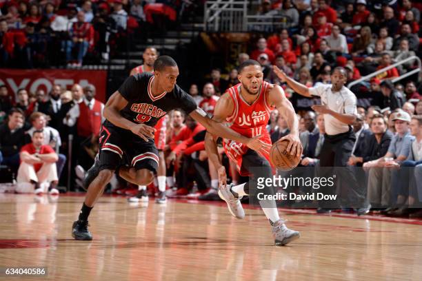 Rajon Rondo of the Chicago Bulls and Eric Gordon of the Houston Rockets go for the loose ball during the game on February 3, 2017 at the Toyota...