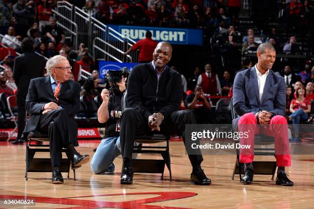 Houston Rockets owner, Leslie Alexander with NBA Legends, Hakeem Olajuwon and Shane Battier look on during the Yao Ming jersey retirement ceremony...