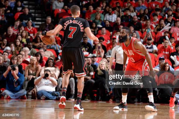 James Harden of the Houston Rockets plays defense against Michael Carter-Williams of the Chicago Bulls during the game on February 3, 2017 at the...