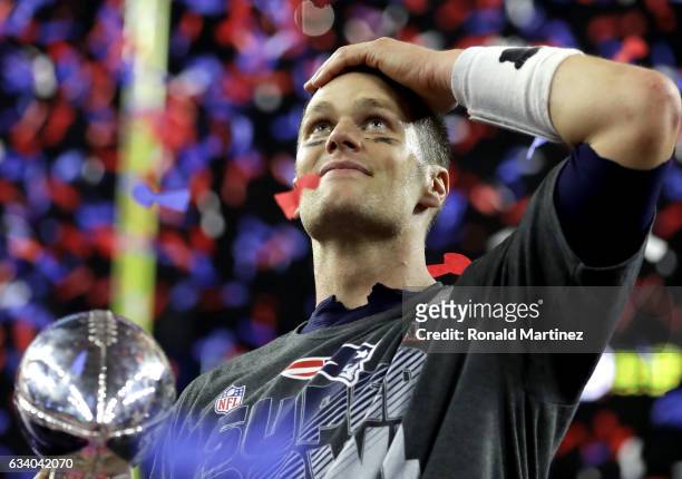 Tom Brady of the New England Patriots celebrates after the Patriots celebrates after the Patriots defeat the Atlanta Falcons 34-28 during Super Bowl...
