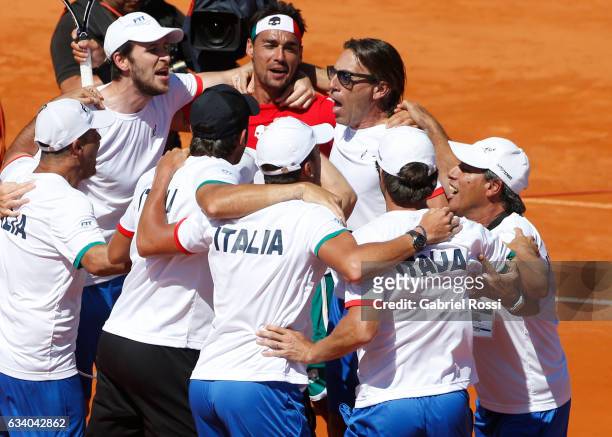 Fabio Fognini of Italy celebrates with teammates after winning the singles match between Guido Pella and Fabio Fognini as part of day 3 of the Davis...