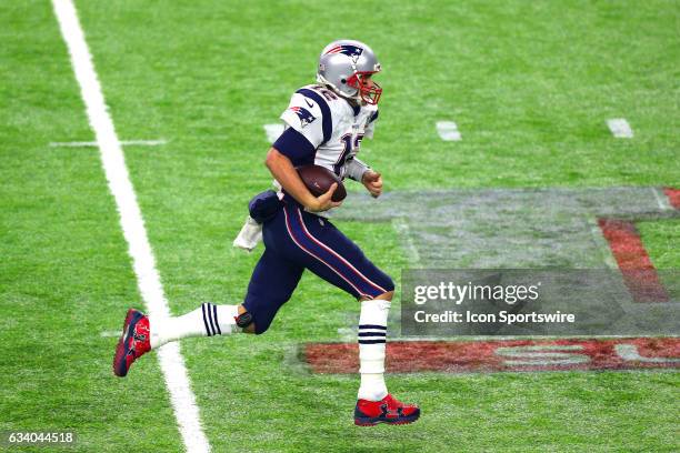 New England Patriots quarterback Tom Brady runs with the ball during the second half of Super Bowl LI on February 5 at NRG Stadium in Houston, TX.