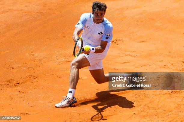 Guido Pella of Argentina takes a backhand shot during a singles match between Guido Pella and Fabio Fognini as part of day 3 of the Davis Cup 1st...