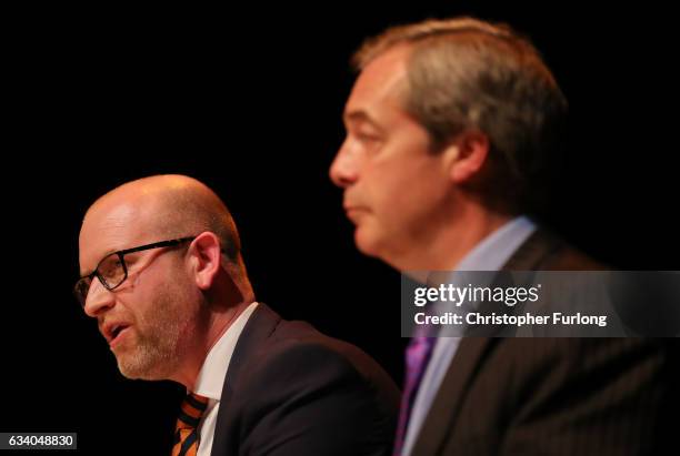 Leader Paul Nuttall and former Leader Nigel Farage MEP speak during a public meeting on February 6, 2017 in Stoke, England. The Stoke-on-Trent...