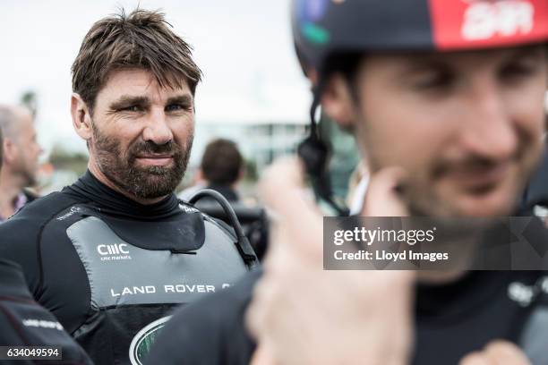 Jono McBeth looks on as he prepares the race yacht prior to the launch of the teams new Land Rover BAR R1 race yacht 'RITA' on February 6, 2017 in...