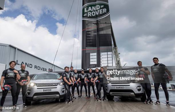 Sir Ben Ainslie skipper of LandRover BAR poses with team-mates as they launch and name the new Land Rover BAR R1 race yacht 'RITA' on February 6,...