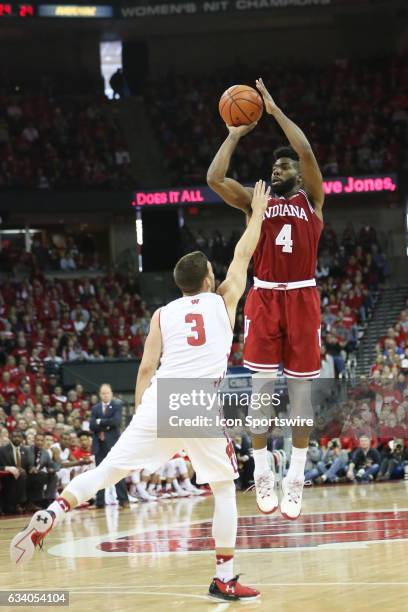 Indiana Hoosiers guard Robert Johnson puts up a 3 pointer during a men's college basketball game between the Wisconsin Badgers and the Indiana...