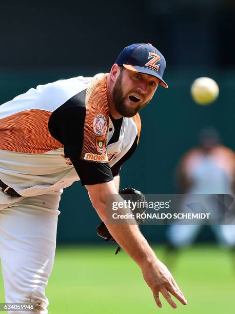 Pitcher Mitch Lively of Aguilas del Zulia from Venezuela throws against Criollos de Caguas of Puerto Rico during the Caribbean Baseball Series at the...