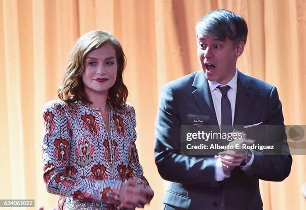 Actress Isabelle Huppert and film editor Tom Cross attend the 89th Annual Academy Awards Nominee Luncheon at The Beverly Hilton Hotel on February 6,...