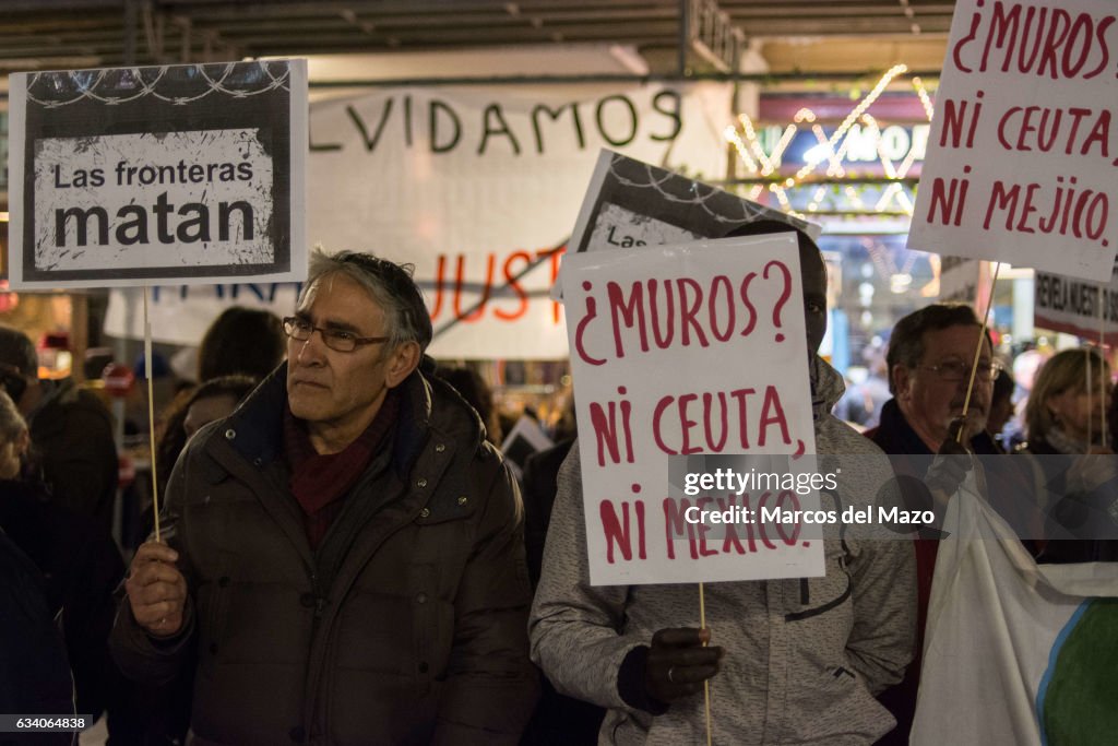 People protesting against walls and boundaries in front of...