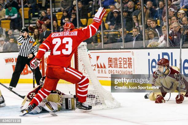 Boston University Terriers forward Jakob Forsbacka Karlsson celebrates a goal on Boston College Eagles goaltender Joseph Woll during the first period...