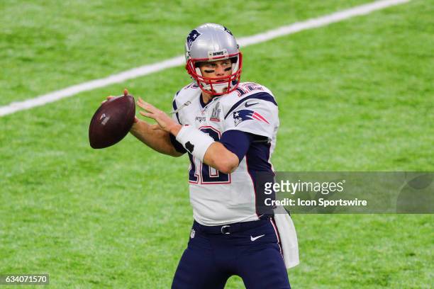 New England Patriots quarterback Tom Brady warms up on the field prior to Super Bowl LI on February 5 at NRG Stadium in Houston, TX.