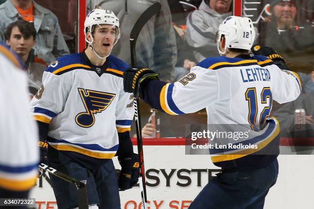 Kenny Agostino of the St Louis Blues celebrates his third period goal against the Philadelphia Flyers with Jori Lehtera on February 6, 2017 at the...