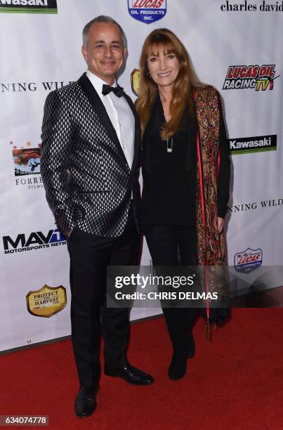 Jane Seymour and Ali Afshar attend the Los Angeles premiere of "Running Wild" at the Chinese 6 Theatre in Hollywood, on February 6, 2017. / AFP /...