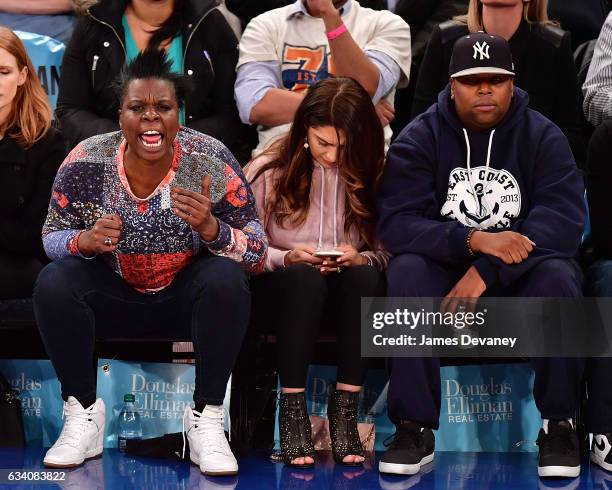 Leslie Jones, guest and Keenan Thompson attend Los Angeles Lakers Vs. New York Knicks game at Madison Square Garden on February 6, 2017 in New York...