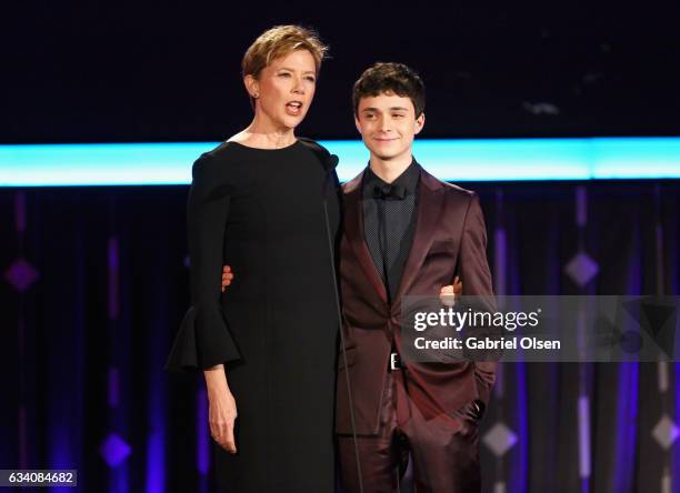 Presenters Annette Bening and Lucas Jade Zumann speak onstage at the 16th Annual AARP The Magazine's Movies For Grownups Awards at the Beverly...