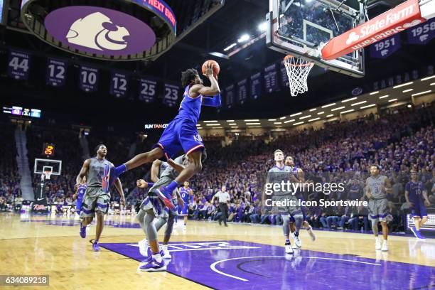 Kansas Jayhawks guard Josh Jackson goes high driving to the basket in the second half of the Big 12 showdown between the Kansas Jayhawks and Kansas...