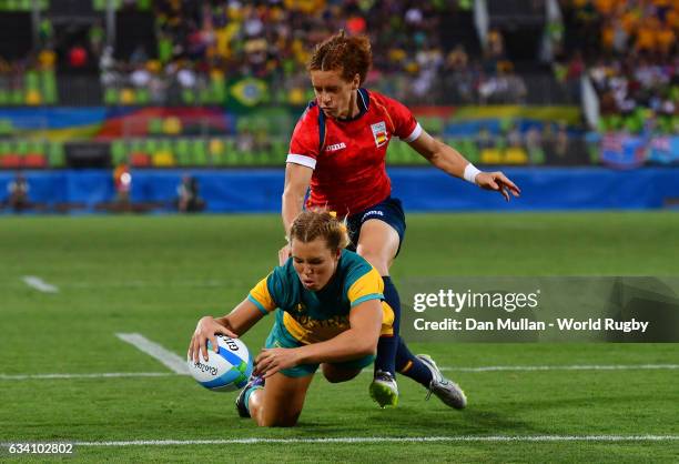 Emma Tonegato of Australia dives over for a try during the Women's Rugby Sevens Quarter Final match between Australia and Spain on Day 2 of the 2016...