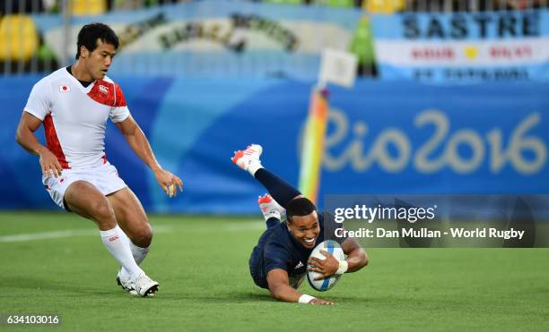 Marcus Watson of Great Britain dives over for a try during the Men's Rugby Sevens Pool C match between Great Britain and Japan on Day 4 of the Rio...