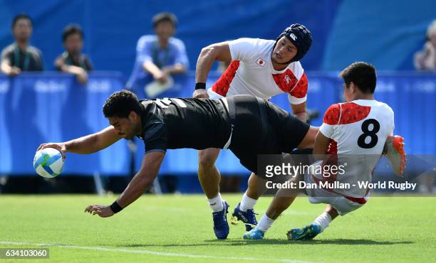 Akira Ioane of New Zeland dives over for a try during the Men's Rugby Sevens Pool C match between New Zealand and Japan on Day 4 of the Rio 2016...