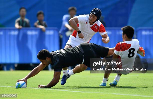 Akira Ioane of New Zeland dives over for a try during the Men's Rugby Sevens Pool C match between New Zealand and Japan on Day 4 of the Rio 2016...