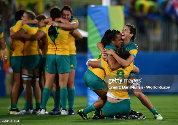 The Australia players celebrate at the final whistle during the Women's Rugby Sevens Gold Medal match between Australia and New Zealand on day 3 of...