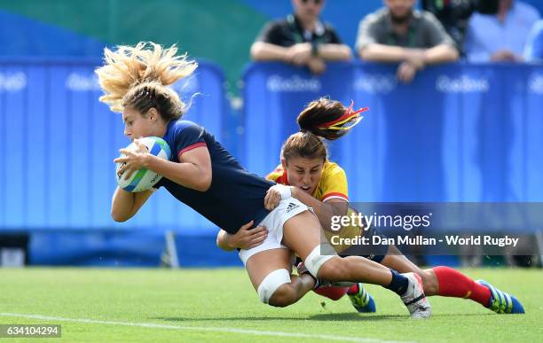 Marjorie Mayans of France dives over for a try during the Women's Rugby Sevens placing match between Spain and France on day 3 of the Rio 2016...
