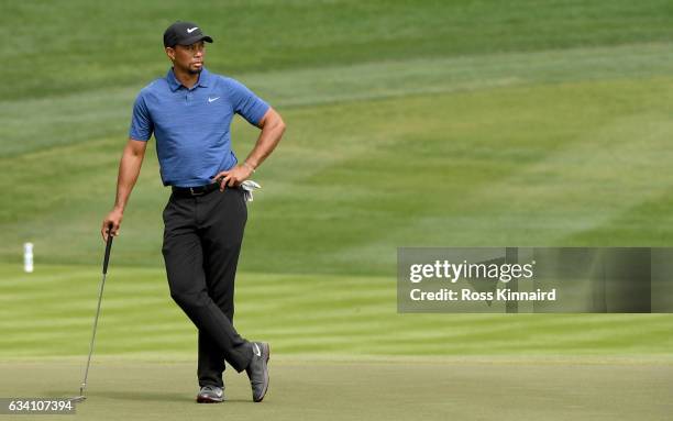 Tiger Woods o f the USA on the 9th green during the first round of the Omega Dubai Desert Classic at Emirates Golf Club on February 2, 2017 in Dubai,...