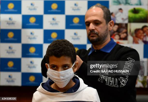 Khalid Mohammad who suffered from Criggler Najjar Syndrome before getting a liver transplant, with his father Abdullah Salim Botturfi Kindi , from...