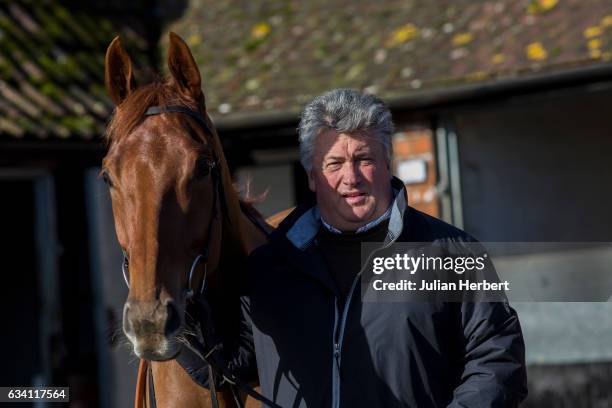 Trainer Paul Nicholls with Movewiththetimes, who is due to run in The Betfair Hurdle Race at Newbury this coming Saturday, during a media open day at...