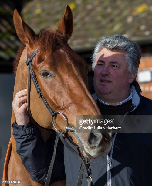 Trainer Paul Nicholls with Movewiththetimes, who is due to run in The Betfair Hurdle Race at Newbury this coming Saturday, during a media open day at...