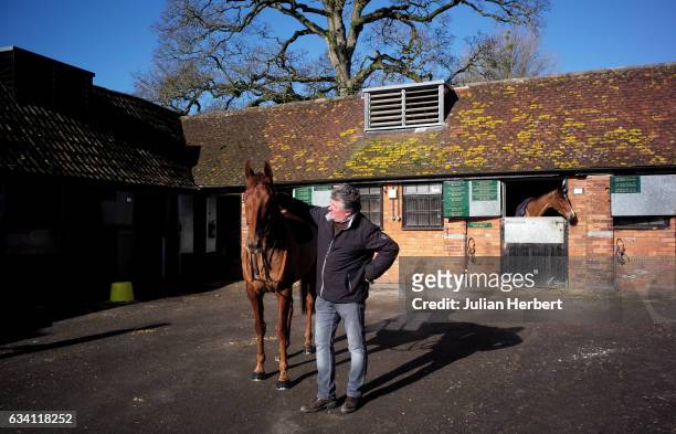 Trainer Paul Nicholls with Movewiththetimes, who is due to run in The Betfair Hurdle Race at Newbury this coming Saturday, during a media open day at...