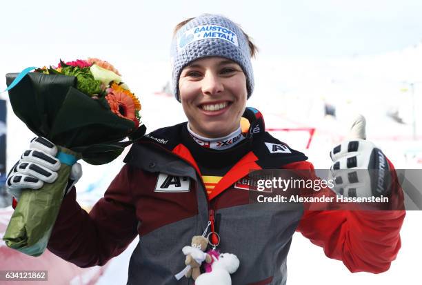 Nicole Schmidhofer of Austria celebrates winning the gold medal after the flower ceremony for the Women's Super G during the FIS Alpine World Ski...