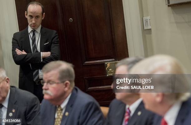 Stephen Miller, White House Senior Advisor, attends a meeting with US President Donald Trump and county sheriffs in the Roosevelt Room of the White...