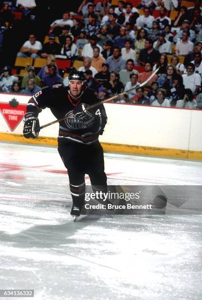 Todd Reirden of the Edmonton Oilers skates on the ice during an NHL game against the Toronto Maple Leafs circa 1997 at the Maple Leaf Garden in...