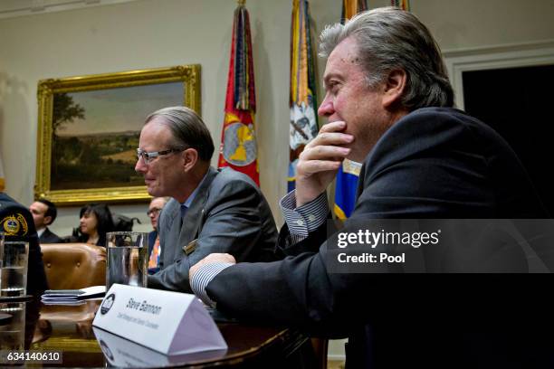 Steve Bannon, chief strategist for U.S. President Donald Trump, and Jonathan Thompson, executive director of the National Sheriffs' Association,...