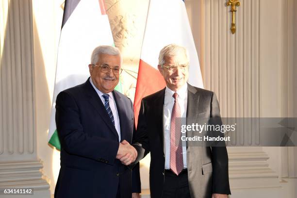 In this handout image supplied by the Palestinian President's Office , President Mahmoud Abbas meets with Claude Bartolone, President of the French...