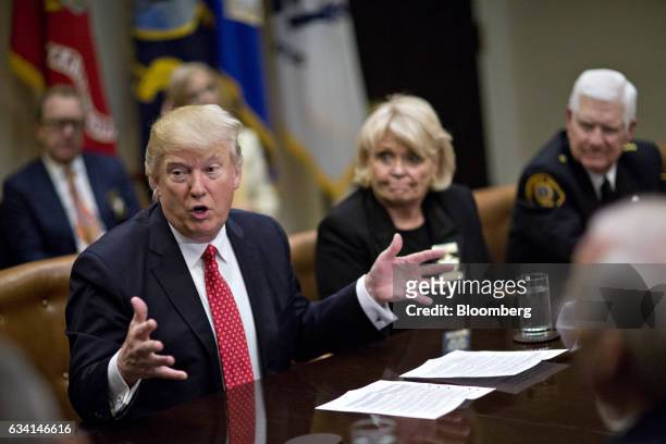 President Donald Trump speaks as he meets with county sheriffs during a listening session in the Roosevelt Room of the White House in Washington,...