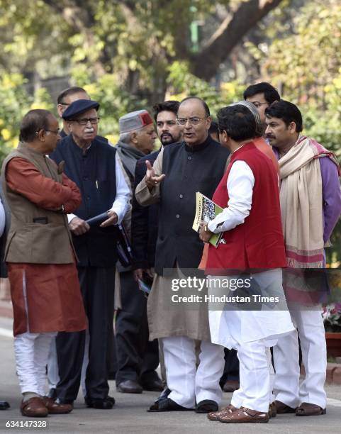 Bharatiya Janta Party senior leader L. K. Advani speaks with Union Finance Minister and Minister of Corporate Affairs Arun Jaitley and other...