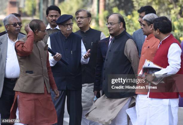 Bharatiya Janta Party senior leader L. K. Advani speaks with Union Finance Minister and Minister of Corporate Affairs Arun Jaitley and other...