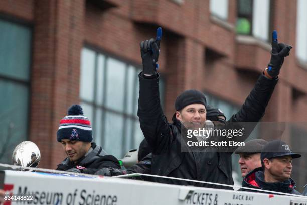 New England Patriots quarterbacks Jimmy Garoppolo and Tom Brady celebrate during the New England Patriots victory parade on February 7, 2017 in...