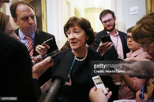 Senator Susan Collins , C, who defected and voted against the GOP majority, speaks to the media after the Senate voted to confirm Betsy DeVos as...