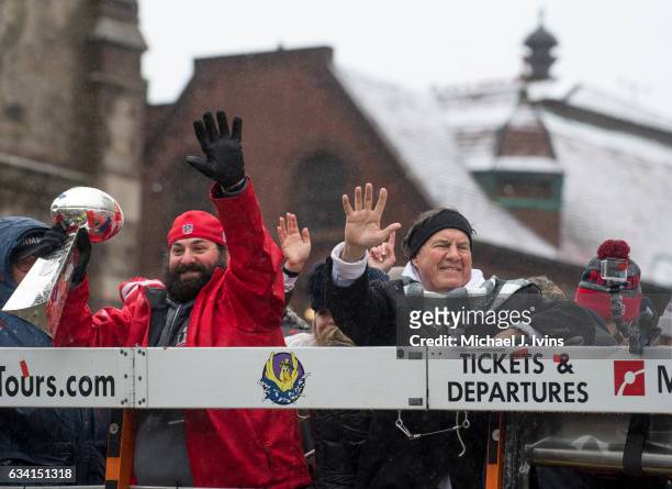 New England Patriots defensive coordinator Matt Patricia and head coach Bill Belichick wave to the crowd during a Super Bowl victory parade on...