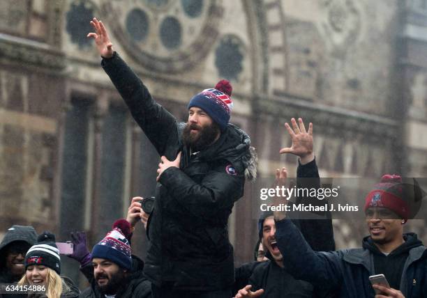 New England Patriots wide receiver Julian Edelman gestures towards the crowd during the Patriots victory parade on February 7, 2017 in Boston,...