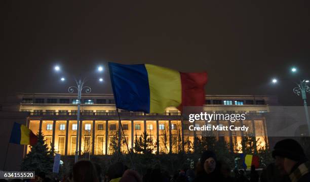 People demonstrate and protest in front of the government headquarters in Victory Square in central Bucharest on February 7, 2017 in Bucharest,...