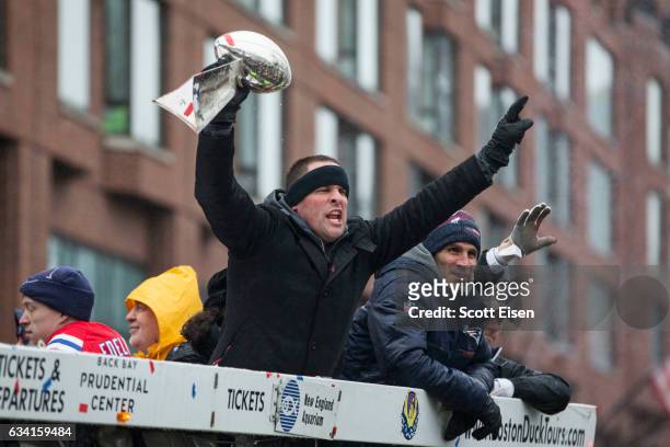 New England Patriots offensive coordinator Josh McDaniels celebrates during the New England Patriots victory parade on February 7, 2017 in Boston,...