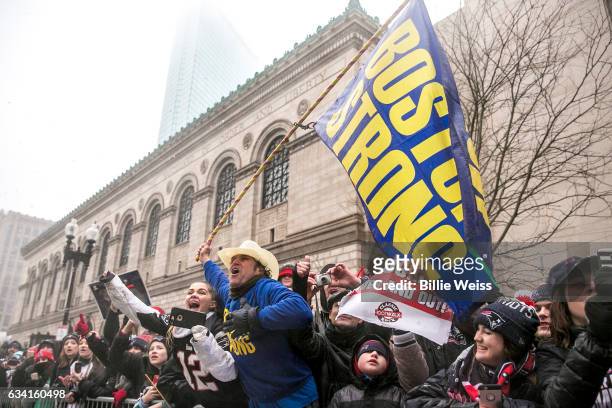 Boston Marathon bombing hero Carlos Arredondo watches the New England Patriots Super Bowl victory parade on February 7, 2017 in Boston,...